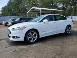 Salvage cars for sale at Austell, GA auction: 2014 Ford Fusion SE Hybrid