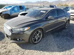 Salvage cars for sale at Magna, UT auction: 2015 Ford Fusion Titanium