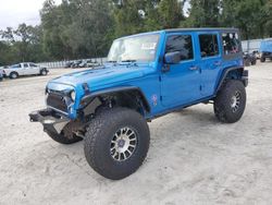 Jeep Wrangler salvage cars for sale: 2014 Jeep Wrangler Unlimited Sport