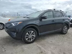 Toyota salvage cars for sale: 2018 Toyota Rav4 HV LE