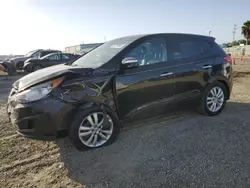 Salvage cars for sale at San Diego, CA auction: 2011 Hyundai Tucson GLS