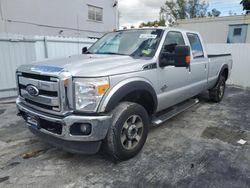 Salvage trucks for sale at Opa Locka, FL auction: 2011 Ford F350 Super Duty