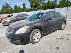 Carros dañados por inundaciones a la venta en subasta: 2010 Nissan Altima SR