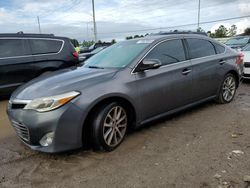 Carros dañados por inundaciones a la venta en subasta: 2014 Toyota Avalon Base