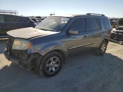 Carros salvage sin ofertas aún a la venta en subasta: 2010 Honda Pilot Touring