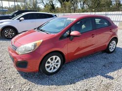 Flood-damaged cars for sale at auction: 2014 KIA Rio LX