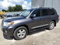 Salvage cars for sale at Apopka, FL auction: 2013 Toyota Land Cruiser