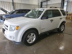 Salvage cars for sale at Casper, WY auction: 2011 Ford Escape Hybrid