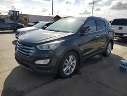 Carros dañados por inundaciones a la venta en subasta: 2014 Hyundai Santa FE Sport