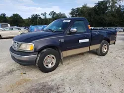 Flood-damaged cars for sale at auction: 1999 Ford F150