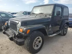 Flood-damaged cars for sale at auction: 2003 Jeep Wrangler Commando