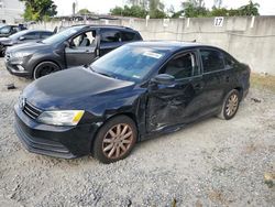 Salvage cars for sale at Opa Locka, FL auction: 2015 Volkswagen Jetta Base