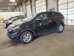 Salvage cars for sale at Blaine, MN auction: 2011 KIA Sportage LX