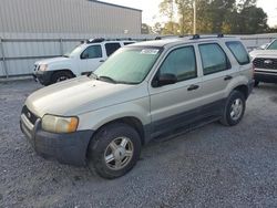 Flood-damaged cars for sale at auction: 2004 Ford Escape XLS