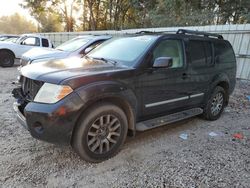 Salvage cars for sale from Copart Midway, FL: 2011 Nissan Pathfinder S