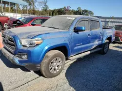 Flood-damaged cars for sale at auction: 2017 Toyota Tacoma Double Cab