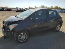 Salvage cars for sale at London, ON auction: 2014 Toyota Yaris