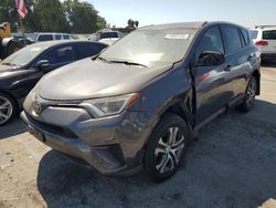 Salvage cars for sale at auction: 2018 Toyota Rav4 LE