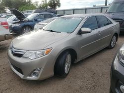 Carros dañados por inundaciones a la venta en subasta: 2014 Toyota Camry SE