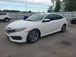 Flood-damaged cars for sale at auction: 2017 Honda Civic EX