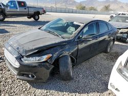 Salvage cars for sale at Magna, UT auction: 2015 Ford Fusion Titanium