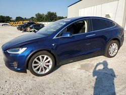 Carros dañados por inundaciones a la venta en subasta: 2017 Tesla Model X