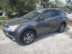 Flood-damaged cars for sale at auction: 2018 Toyota Rav4 LE