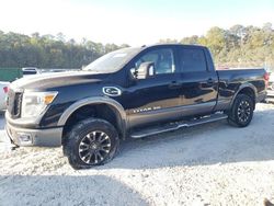 Salvage cars for sale at Ellenwood, GA auction: 2017 Nissan Titan XD SL