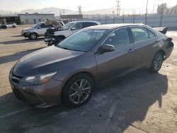 Salvage cars for sale from Copart Sun Valley, CA: 2015 Toyota Camry LE