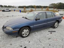 Salvage cars for sale at Fairburn, GA auction: 1995 Pontiac Grand AM SE