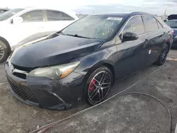 Flood-damaged cars for sale at auction: 2015 Toyota Camry LE