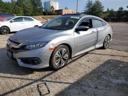 Flood-damaged cars for sale at auction: 2016 Honda Civic EX