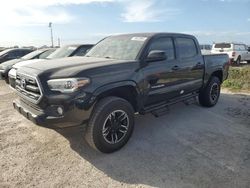 Flood-damaged cars for sale at auction: 2016 Toyota Tacoma Double Cab