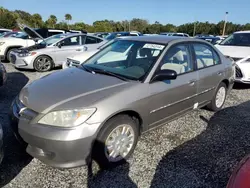 Carros dañados por inundaciones a la venta en subasta: 2004 Honda Civic LX