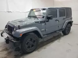 Jeep Wrangler salvage cars for sale: 2014 Jeep Wrangler Unlimited Sahara