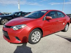 Carros dañados por inundaciones a la venta en subasta: 2015 Toyota Corolla L