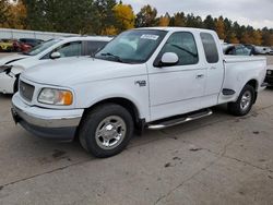 Salvage cars for sale at Eldridge, IA auction: 2000 Ford F150