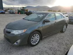 Salvage cars for sale at auction: 2014 Toyota Camry Hybrid