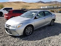 Salvage cars for sale at Reno, NV auction: 2015 Toyota Camry Hybrid