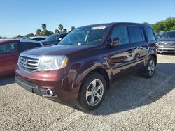 Flood-damaged cars for sale at auction: 2014 Honda Pilot Exln