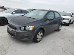 Carros dañados por inundaciones a la venta en subasta: 2013 Chevrolet Sonic LS