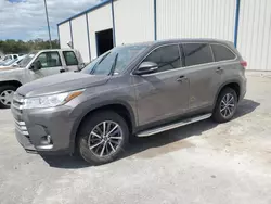 Flood-damaged cars for sale at auction: 2019 Toyota Highlander SE