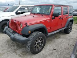 Salvage cars for sale from Copart Arcadia, FL: 2011 Jeep Wrangler Unlimited Sport