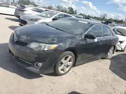 Carros dañados por inundaciones a la venta en subasta: 2014 Toyota Camry L