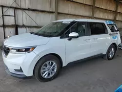 Salvage cars for sale at Phoenix, AZ auction: 2023 KIA Carnival LX