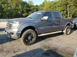 Flood-damaged cars for sale at auction: 2014 Ford F150 Supercrew