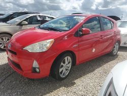 Flood-damaged cars for sale at auction: 2012 Toyota Prius C