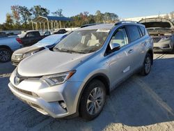 Flood-damaged cars for sale at auction: 2016 Toyota Rav4 HV XLE