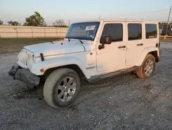 Salvage cars for sale from Copart Houston, TX: 2013 Jeep Wrangler Unlimited Sahara