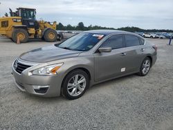 Carros dañados por inundaciones a la venta en subasta: 2014 Nissan Altima 2.5